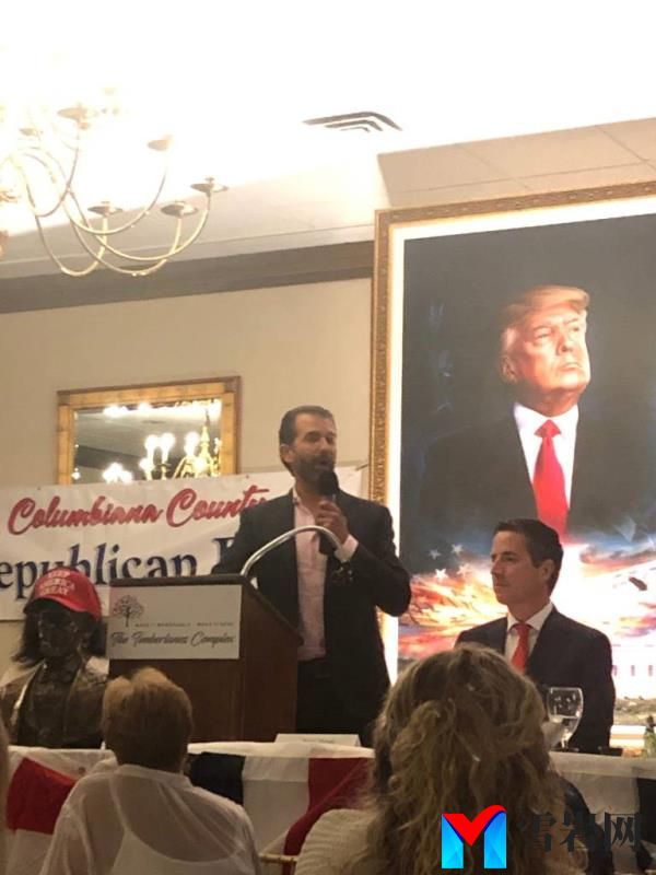 Do<em></em>nald Trump Jr. speaking at a podium during the annual Lincoln Day Dinner in Salem.