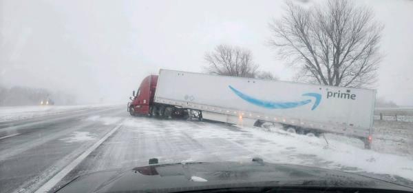 A tractor trailer veers into ditch on Christmas Day on Interstate 80 in Nebraska as a winter storm pummels part of the Midwest, on Monday, Dec. 25, 2023. 