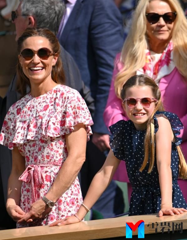 Pippa Middleton and Princess Charlotte of Wales court-side of Centre Court during the men