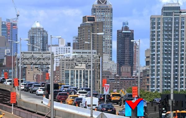Bumper to bumper traffic heads over the Ed Koch Queensboro Bridge into Manhattan