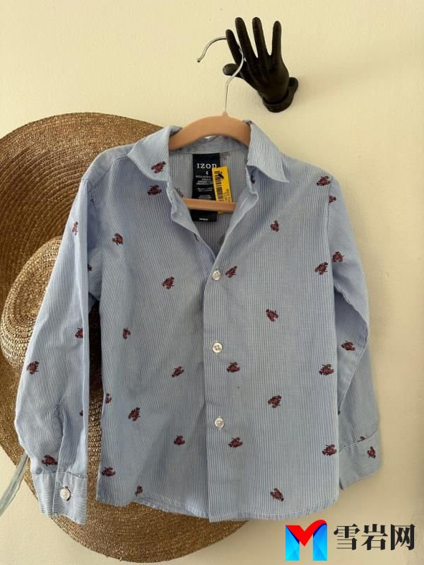 This Izod blue button down is part of her burgeo<em></em>ning collection.