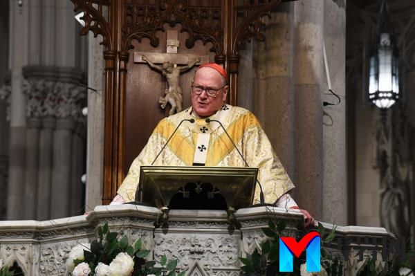 Cardinal Timothy Dolan gives Easter Day Mass to a full house at St Patrick