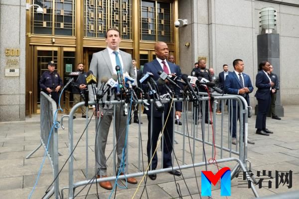 New York City Mayor Eric Adams and lawyer Alex Spiro speak to the media, on the day of Adams arraignment after he was charged with bribery and illegally soliciting a campaign co<em></em>ntribution from a foreign national, outside a federal court in New York City, U.S. September 27, 2024.