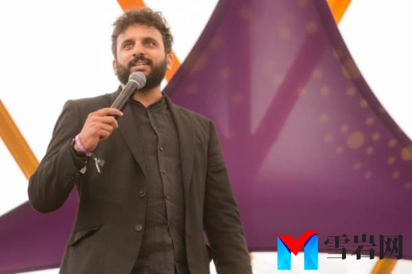 Comedian Nish Kumar performs at the Henham Park during a
