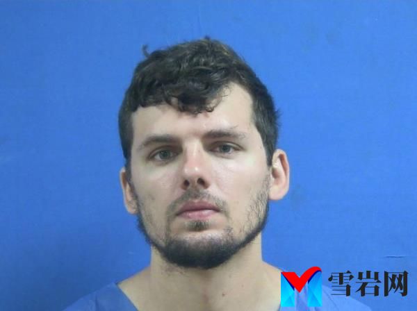 Zachary Mowel mugshot with blue background