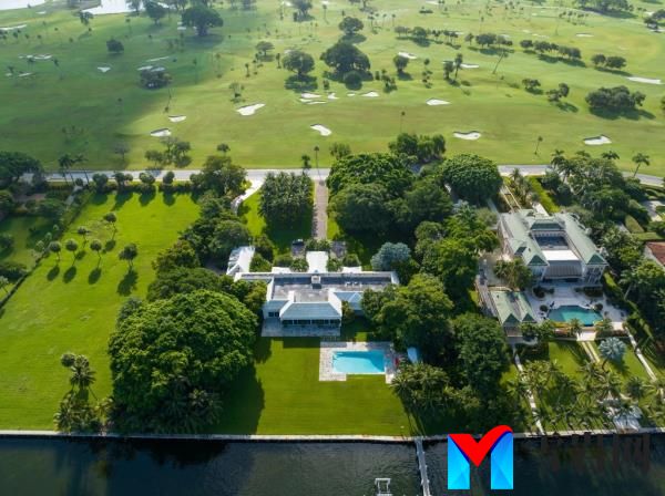 The property is equipped with a library, theater, sauna and seven bedrooms.