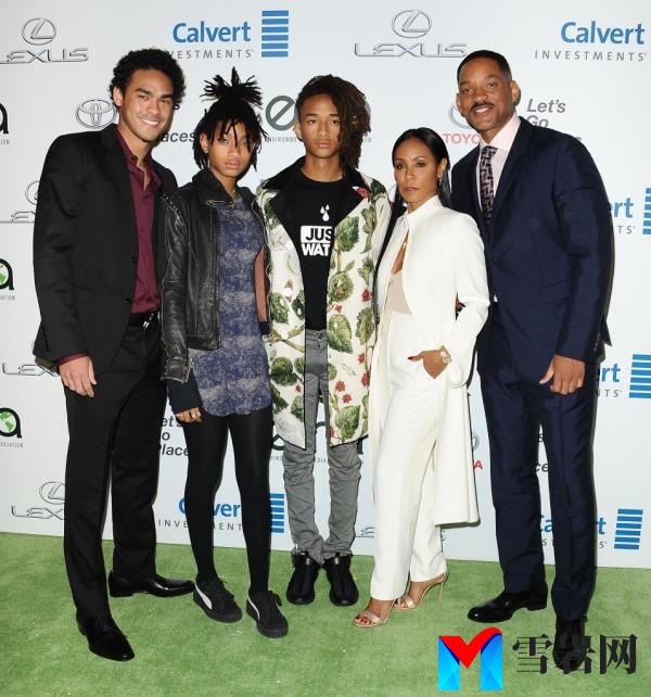 Trey Smith, Willow Smith and Jaden Smith pose on a red carpet with parents Will and Jada Pinkett Smith in 2016.