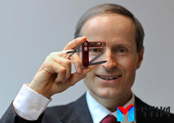 Victorinox CEO Carl Elsener holding a Swiss Army knife