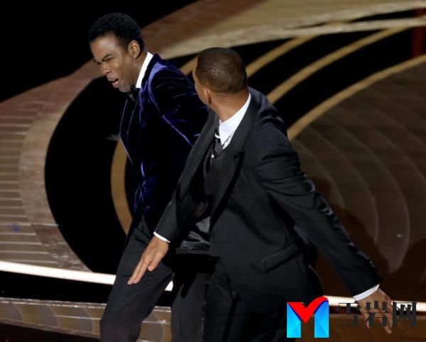 Will Smith slaps Chris Rock at the 2022 Oscars.