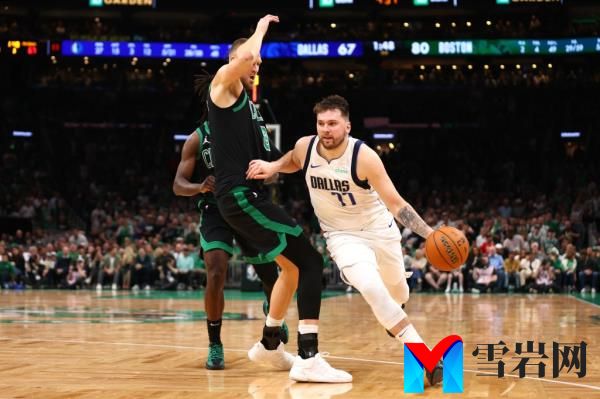 Luka Do<em></em>ncic (77) drives to the basket against the Celtics in Game 2 of the NBA Finals on June 9, 2024.