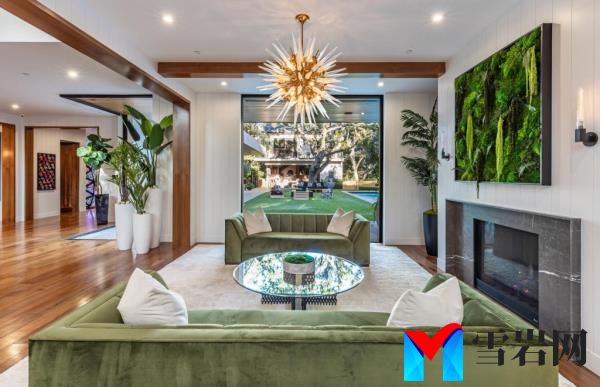 A chandeliered room inside the home. 