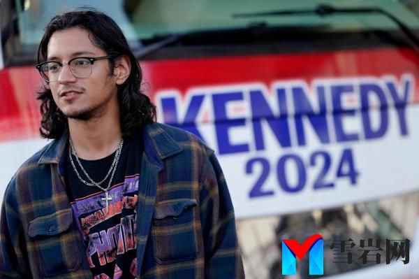 Christian Ortez waits in line to enter a voter rally for Independent presidential candidate Robert F. Kennedy Jr., Wednesday, Dec. 20, 2023, in Phoenix. 