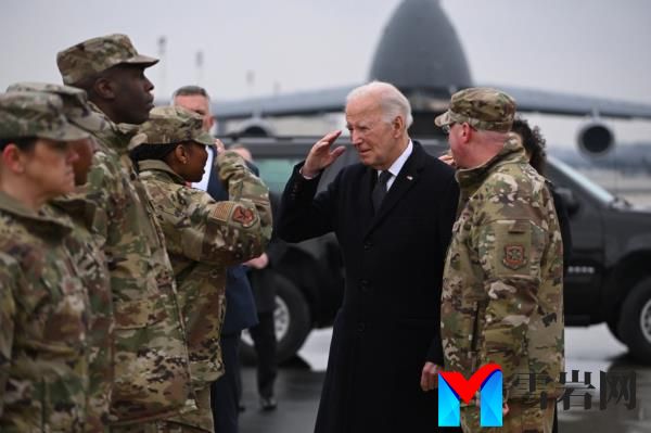 US President Joe Biden greets military perso<em></em>nnel on arrival at Dover Air Force ba<em></em>se in Dover, Delaware, on February 2, 2024, to attend the dignified transfer of the remains of three US service members killed in the drone attack on the US military outpost in Jordan.