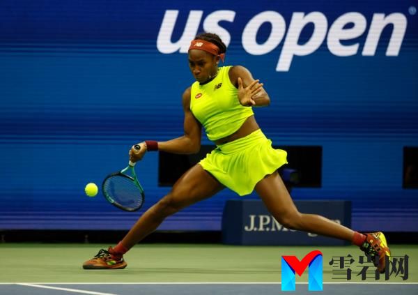 Coco Gauff of the USA,  returns a volley against Elise Mertens 