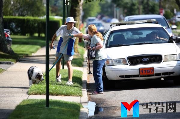 Ellerup greeted a man walking his dog before heading into her home Friday. 