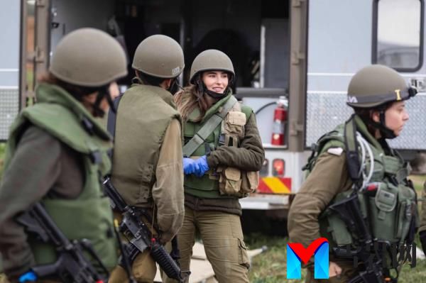 Miss Israel, Noa Cochva, posing in her IDF uniform, former battlefield medic and paramedic course instructor-commander