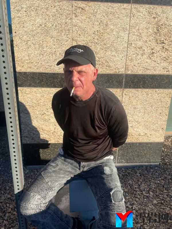A photo taken by police in Las Vegas captured Guty sitting outside, handcuffed with a cigarette hanging out of his mouth following his arrest at the casino. 