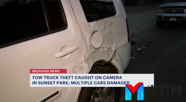 Image of a white vehicle with dents. 
