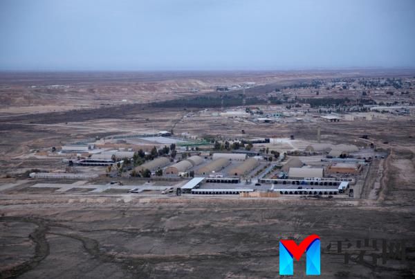 In this Sunday, Dec. 29, 2019 file photo taken from a helicopter shows Ain al-Asad air ba<em></em>se in the western Anbar desert, Iraq