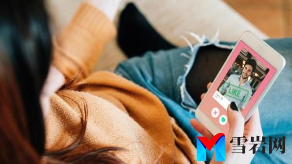 Young adult woman swiping on an o<em></em>nline dating app