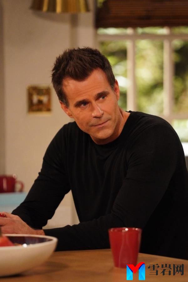 Cameron Mathison smiling with his wife, Vanessa. 