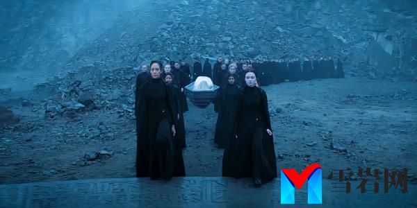 The Bene Gesserit form a line in a rocky area in Dune: Prophecy