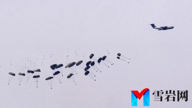 Parachutes dro<em></em>p supplies into the northern Gaza Strip, as seen from southern Israel this week.